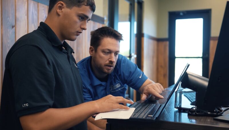 Ozarks Teen Challenge student and instructor goal setting and education in Branson West, MO