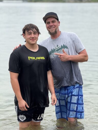 Teen boy Lucas getting baptized