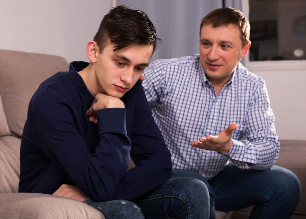 Parent talking to teen